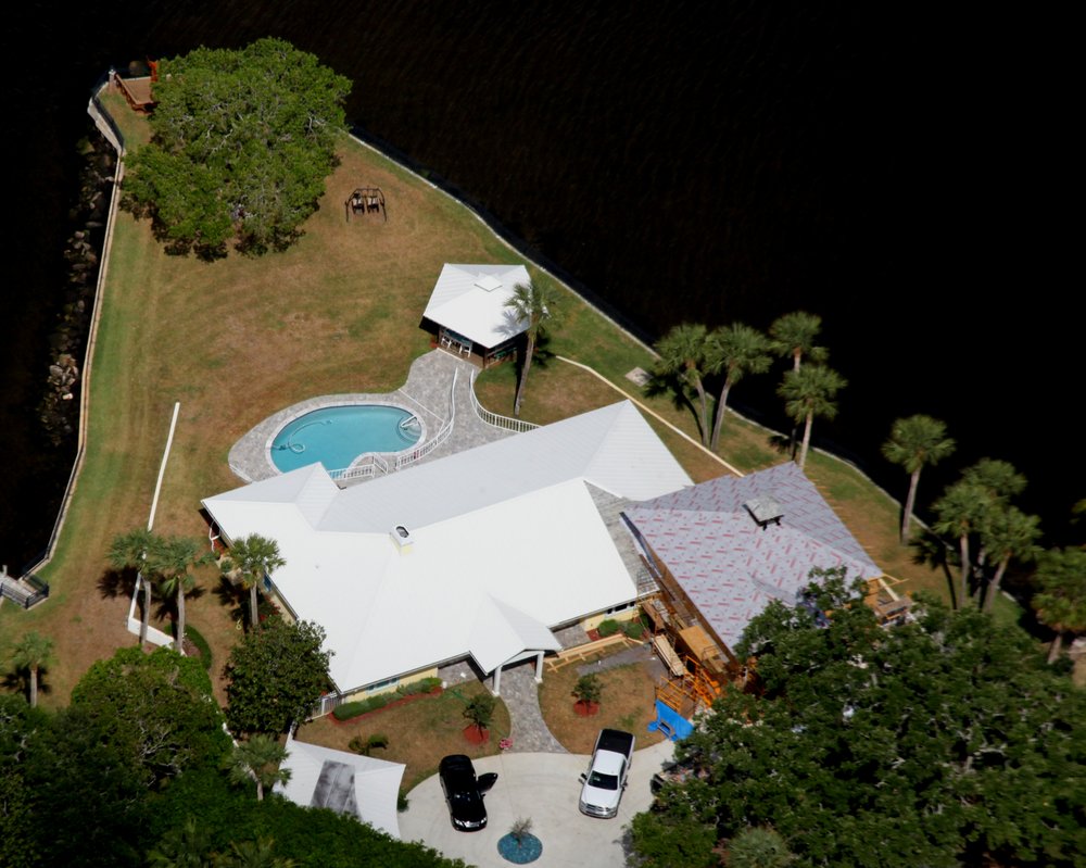Slide of All American Roofing And Coating Of Florida