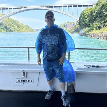 Niagara Falls Adventure Tours - Me with the poncho on the boat . Maid of the mist - Walking Tours Near Me