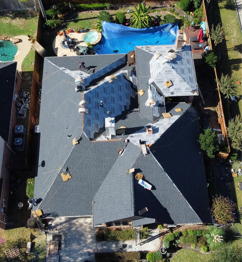 Slide of REAL Roofing and Construction