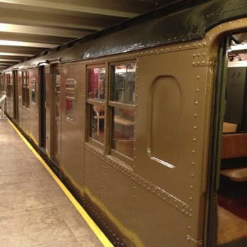New York Transit Museum - Old subway cars in a working station on the lower level - Museums Near Me - Brooklyn, New York