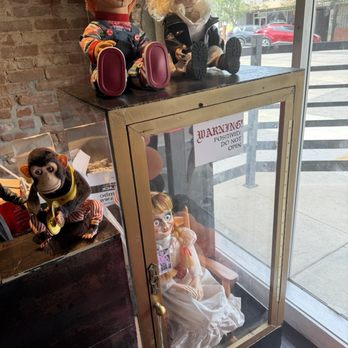 Twisted Coffee - Annabelle doll in case - Coffee & Tea Near Me - Bakersfield, California Twisted Coffee - Annabelle doll in case - Coffee & Tea Near Me - Bakersfield, California