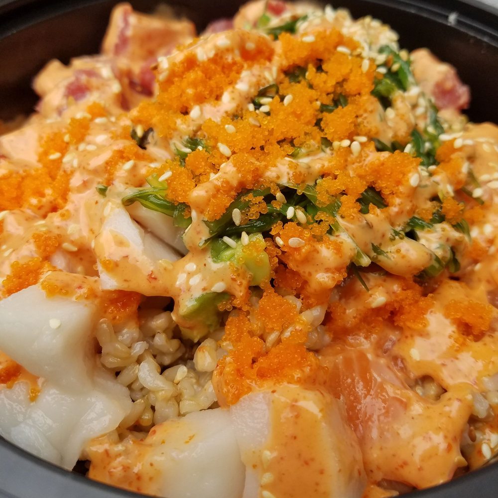 Tuna, salmon and white tuna w spicy mayo. That mayo is no joke! Tuna, salmon and white tuna w spicy mayo. That mayo is no joke!