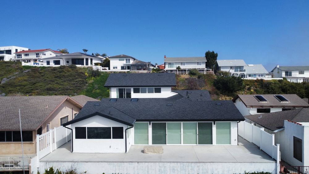 Slide of New Village Roofing