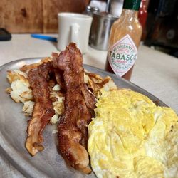 Two eggs, American fries, the side of bacon