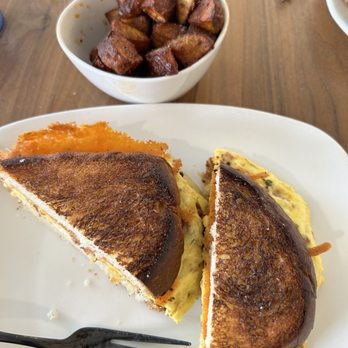 Pan & Coffee - Egg sandwich with roasted potatoes on side - Coffee & Tea Near Me - San Antonio, Texas