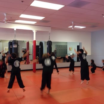 White Dragon Martial Arts - Kids warming up for grappling  "happy stars"!! - Martial Arts Near Me - San Marcos, California