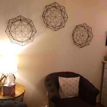 The Studio Massage & Esthetics - Geometric decorations in the seating area. - Massage Therapy Near Me - Renton, Washington The Studio Massage & Esthetics - Geometric decorations in the seating area. - Massage Therapy Near Me - Renton, Washington