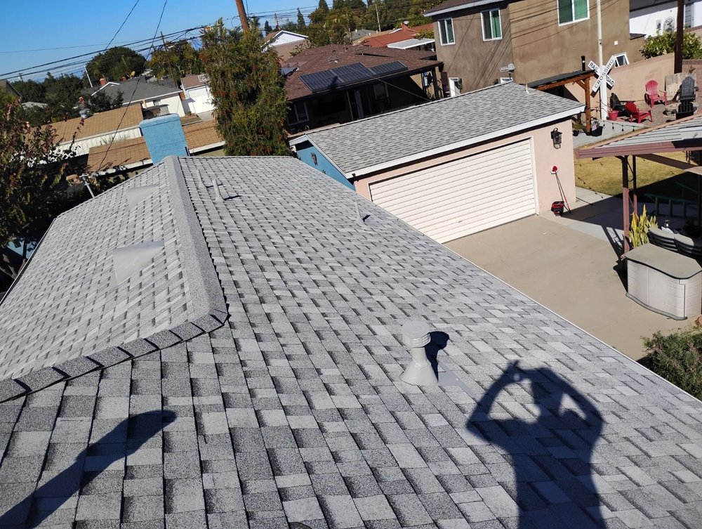 Slide of Sam's Roofing Co