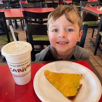 Caramba Mexican Food - My son enjoying his cheese crisp and Pepsi - Mexican Near Me - Glendale, Arizona Caramba Mexican Food - My son enjoying his cheese crisp and Pepsi - Mexican Near Me - Glendale, Arizona