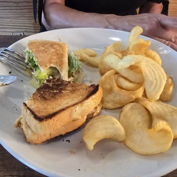 Tavern 242 - Half of the Adult Grilled Cheese and a part of the Rotisserie Chicken Sammy along with the 242 fries. - Sports Bars Near Me - Morrison, Colorado Tavern 242 - Half of the Adult Grilled Cheese and a part of the Rotisserie Chicken Sammy along with the 242 fries. - Sports Bars Near Me - Morrison, Colorado