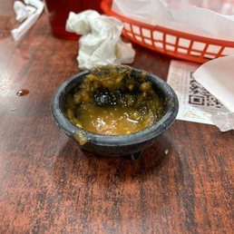 Tiny "bowl" of salsa for 4 people! A tortilla chip couldn't even fit inside to get salsa. Tiny "bowl" of salsa for 4 people! A tortilla chip couldn't even fit inside to get salsa.