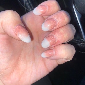 Golden Nail - Unevenly shaped. Thick as Lizzie and no kind of consistency to the design. - Nail Salons Near Me - Leominster, Massachusetts