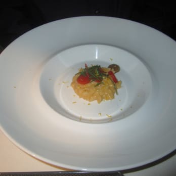 Chez TJ - Our third course, a risotto of Santa Barbara sea urchin, prepared with lemon, peppers, and sorrel. - French Near Me - Mountain View, California Chez TJ - Our third course, a risotto of Santa Barbara sea urchin, prepared with lemon, peppers, and sorrel. - French Near Me - Mountain View, California