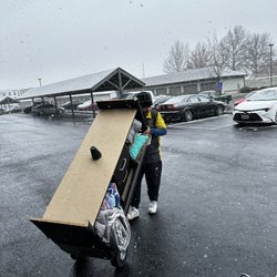 Pantheon Moving - Snow won't slow us down! Our team member shines bright amidst the snow.