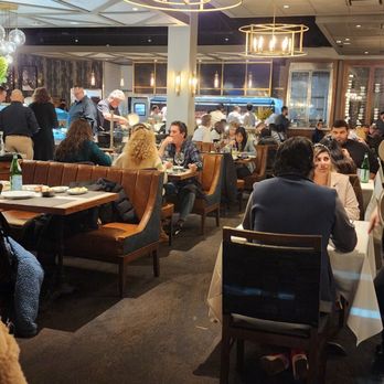Fogo de Chão - Interior in a large spacious dining hall - Brazilian Near Me - Huntington Station, New York Fogo de Chão - Interior in a large spacious dining hall - Brazilian Near Me - Huntington Station, New York