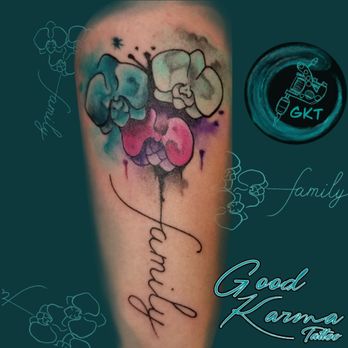 Good Karma Tattoo Studio - Water color lilies tattooed by Albert - Tattoo Near Me - Mary Esther, Florida