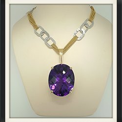 Legend Jewelers by Mark Priest - A lip smackin 36 carat grape amethyst