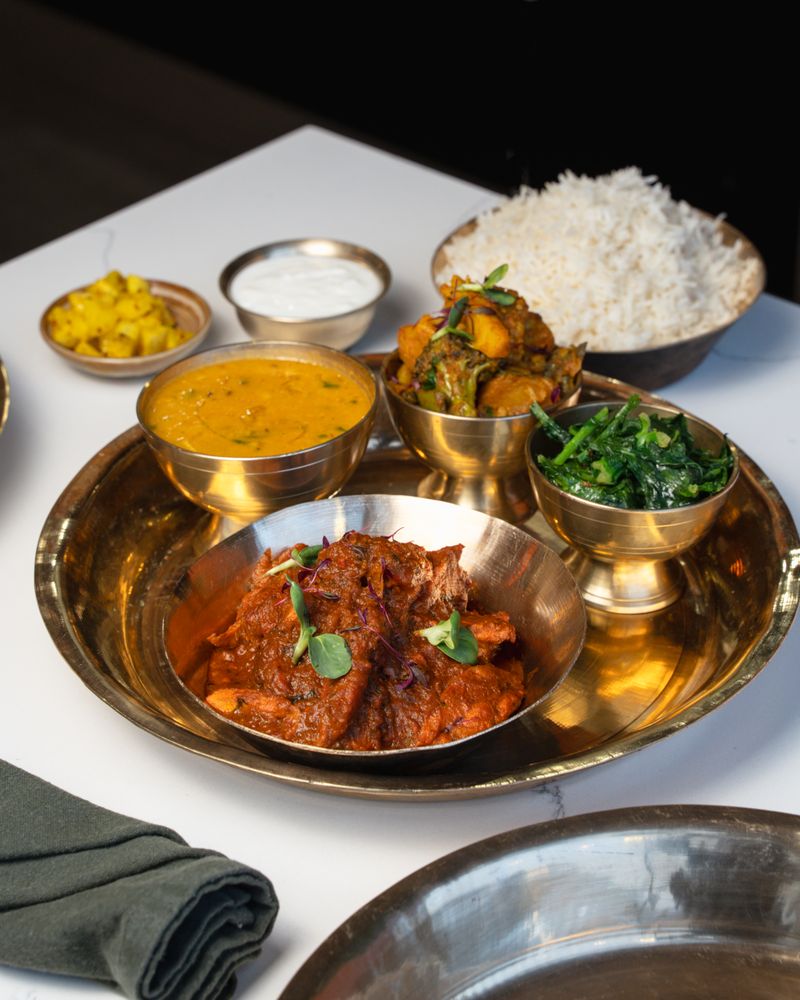 Aama Nepalese Cuisine Logo