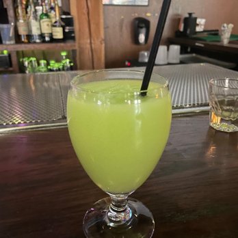 Emporium Arcade Bar - The green slushee tastes like a pina colada and it's the best! Green  red slushee - Bars Near Me - Chicago, Illinois