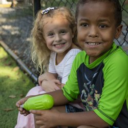 Preschoolers hanging out outside.
