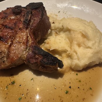 Jameson's Charhouse - Overcooked pork chop... looks good.  Wasn't. - American Near Me - Skokie, Illinois