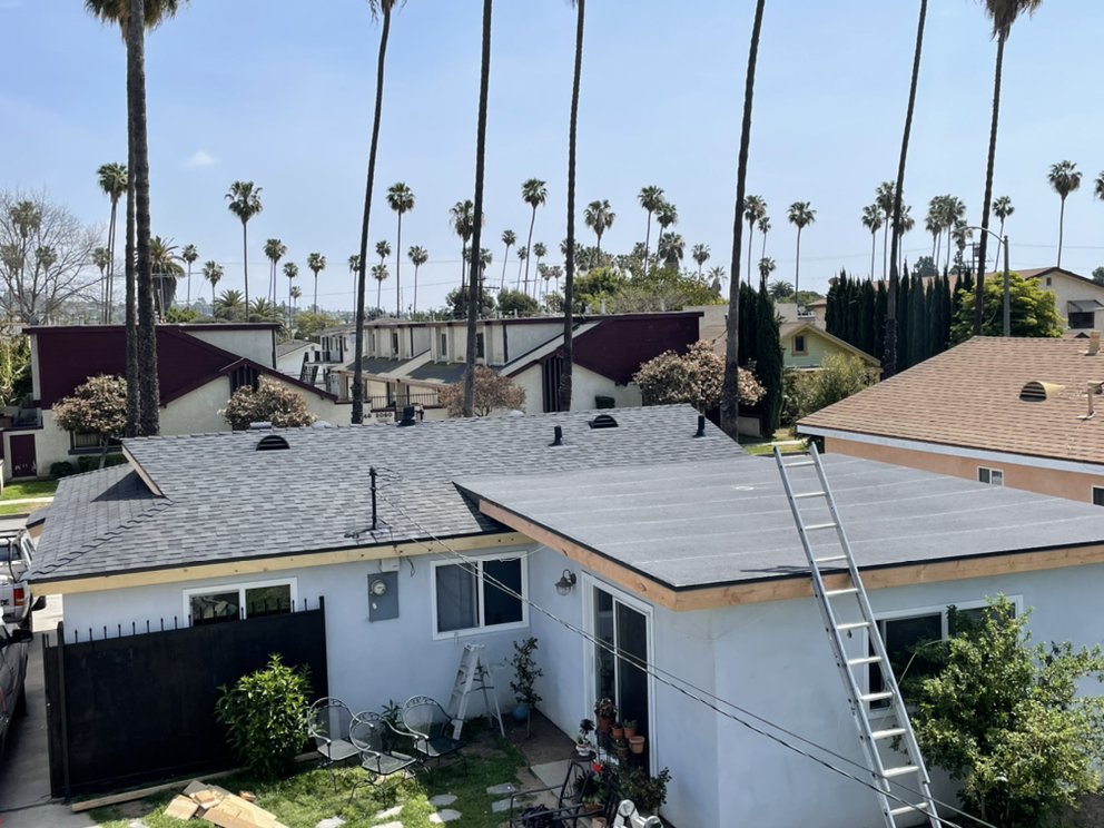 Slide of Enriquez Roofing