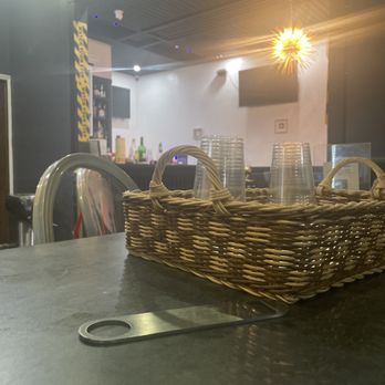 Wakky's African Restaurant - a wicker basket with a pair of scissors - African Near Me - Brooklyn, New York Wakky's African Restaurant - a wicker basket with a pair of scissors - African Near Me - Brooklyn, New York