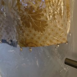 Premiere Cleaners - Just one of the missing pearls from my dress, the top half was also filled with small holes all throughout.