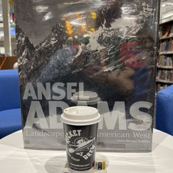 Rocket Brew Coffee - Coffee in front of picture book.