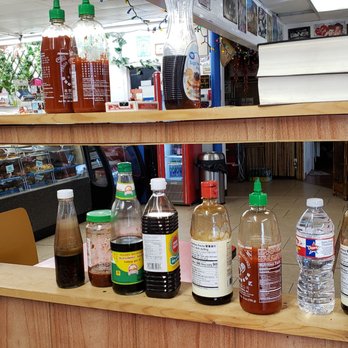 AM Donuts and Croissants - a variety of condiments - Donuts Near Me - Abilene, Texas AM Donuts and Croissants - a variety of condiments - Donuts Near Me - Abilene, Texas