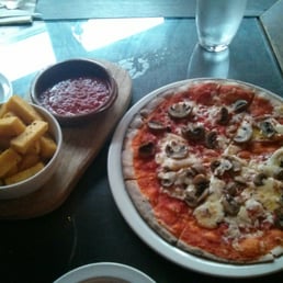 Mushroom pizza, polenta chips with extra pizza sauce