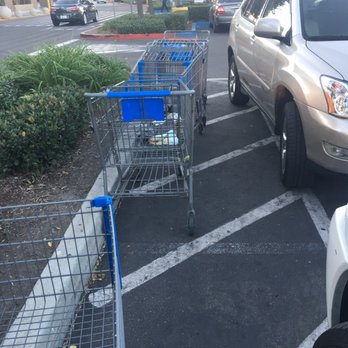 Walmart Supercenter - Look closely in the shopping cart.  Disgusting.  Close to front of the store and just sitting there. - Department Stores Near Me - Chino, California