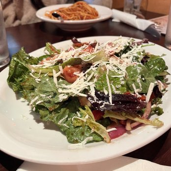 Pasta Polo - a plate of salad and a glass of water - Italian Near Me - Langley, British Columbia
