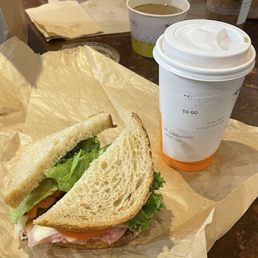 Ham and Swiss on sourdough and Wildflower Cappuccino