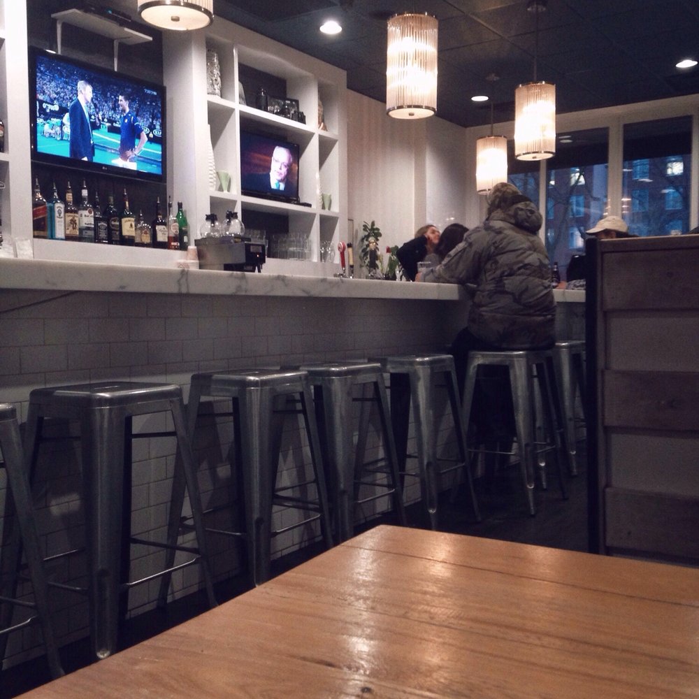 Frankie's - Seating is mostly two seaters and bar stools near the front. Larger tables are at the back. - Breakfast & Brunch Near Me - Toronto, Ontario