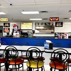 KidMania - Plenty of tables to watch your kids play or to eat snacks.