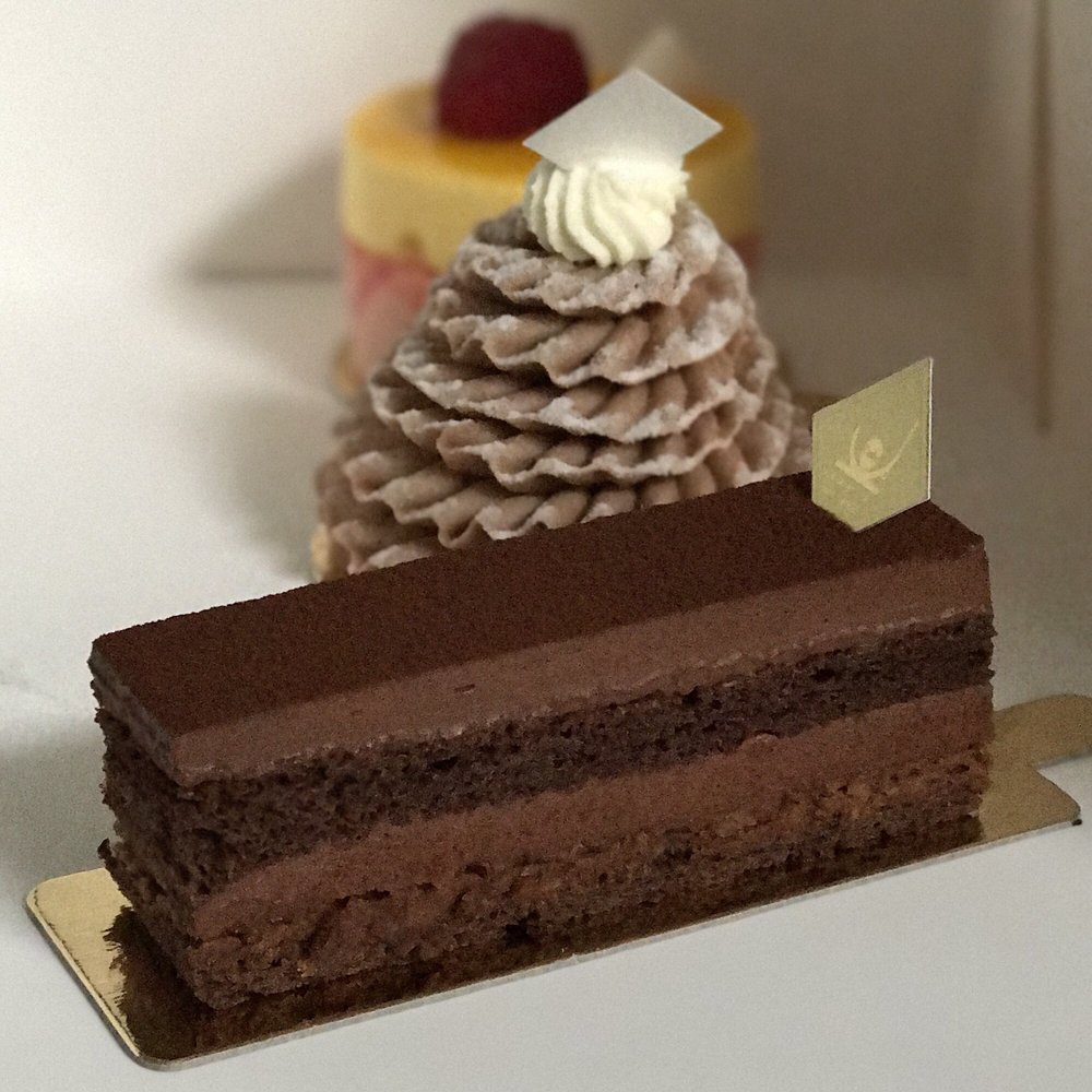 Café Komine - Cakes to go. Amazed they arrived home in one piece lol. - Cafes Near Me - Berlin, BE