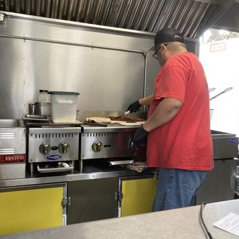 Los Viejones - The owner preparing the order of gringas - Mexican Near Me - San Antonio, Texas Los Viejones - The owner preparing the order of gringas - Mexican Near Me - San Antonio, Texas