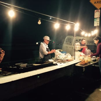 Tacos Bob - a group of people at a food stand - Mexican Near Me - Los Angeles, California Tacos Bob - a group of people at a food stand - Mexican Near Me - Los Angeles, California