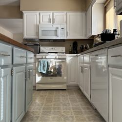Silverwing Home Improvement - Refinished cabinets
