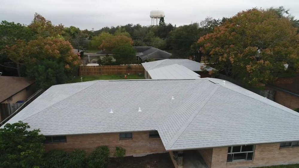 Slide of Vasquez Roofing Company