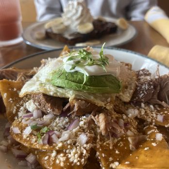 Chuponcito - Bomb CHILAQUILES with carnitas, egg and aguacate - Mexican Near Me - Aliso Viejo, California Chuponcito - Bomb CHILAQUILES with carnitas, egg and aguacate - Mexican Near Me - Aliso Viejo, California