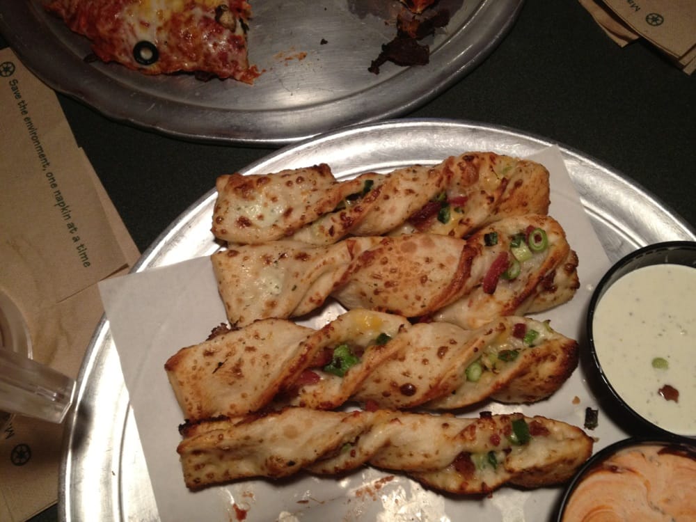 Photo of Boulder Creek Pizza & Pub - Boulder Creek, CA, United States. Bacon breadsticks (free w pitcher of beer!)