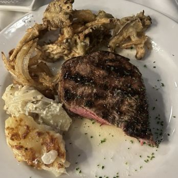 Remingtons Prime Steakhouse - Delmonico steak, Gouda scalloped potatoes, Fried wild mushrooms and onions - Steakhouses Near Me - Ocala, Florida Remingtons Prime Steakhouse - Delmonico steak, Gouda scalloped potatoes, Fried wild mushrooms and onions - Steakhouses Near Me - Ocala, Florida
