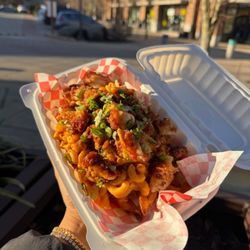 Supreme Wings - Loaded Fries: Fries, Mac & Cheese, Chopped Chicken w/ your choice of flavor on top.