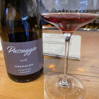 Passaggio Wines - a glass of wine and a bottle of wine - Wine Bars Near Me - Glen Ellen, California Passaggio Wines - a glass of wine and a bottle of wine - Wine Bars Near Me - Glen Ellen, California