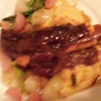 Stone Creek Bistro - Lamb Osso Bucco with Spring Onions and Cheesy Grits ($29) - New American Near Me - Blue Jay, California Stone Creek Bistro - Lamb Osso Bucco with Spring Onions and Cheesy Grits ($29) - New American Near Me - Blue Jay, California