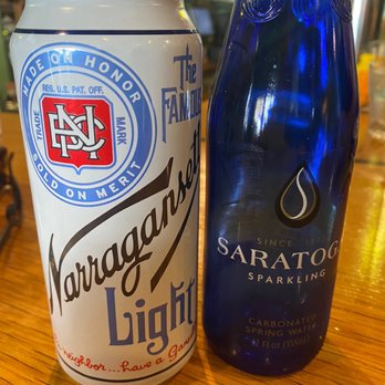 Sweet Grass Grill - a blue bottle and a blue glass - New American Near Me - Tarrytown, New York Sweet Grass Grill - a blue bottle and a blue glass - New American Near Me - Tarrytown, New York