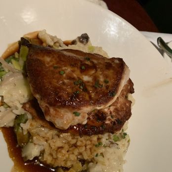 The Capital Grille - Roasted Chicken Breast with Mushrooms and Parmesan Risotto - Steakhouses Near Me - Palm Beach Gardens, Florida The Capital Grille - Roasted Chicken Breast with Mushrooms and Parmesan Risotto - Steakhouses Near Me - Palm Beach Gardens, Florida