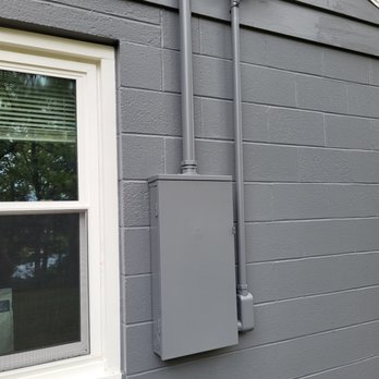 Rat-A-Tat Renovations - ows an electrical box on the side of a house - General Contractors Near Me Rat-A-Tat Renovations - ows an electrical box on the side of a house - General Contractors Near Me